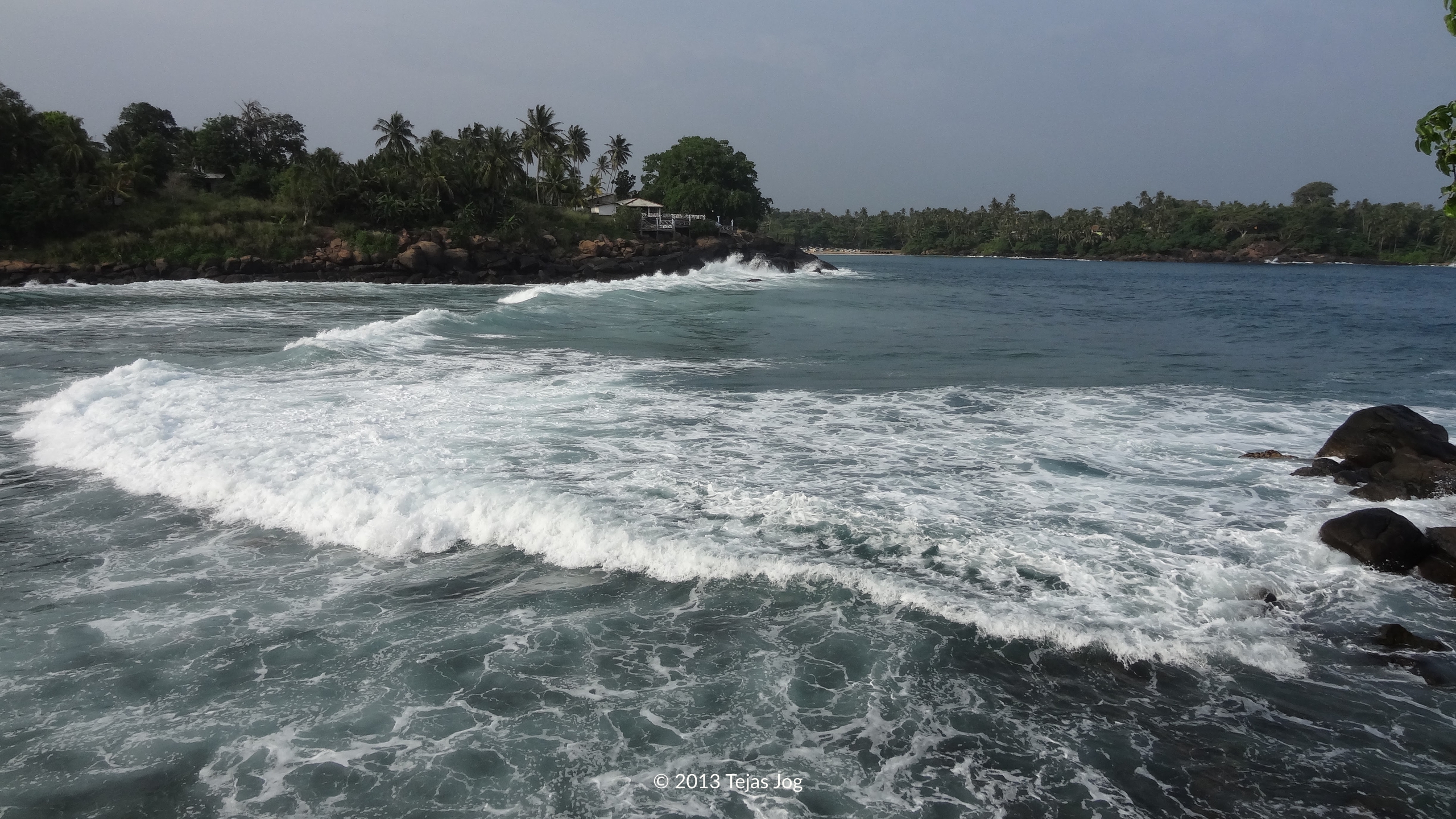 Waves crashing along the Dondra headland