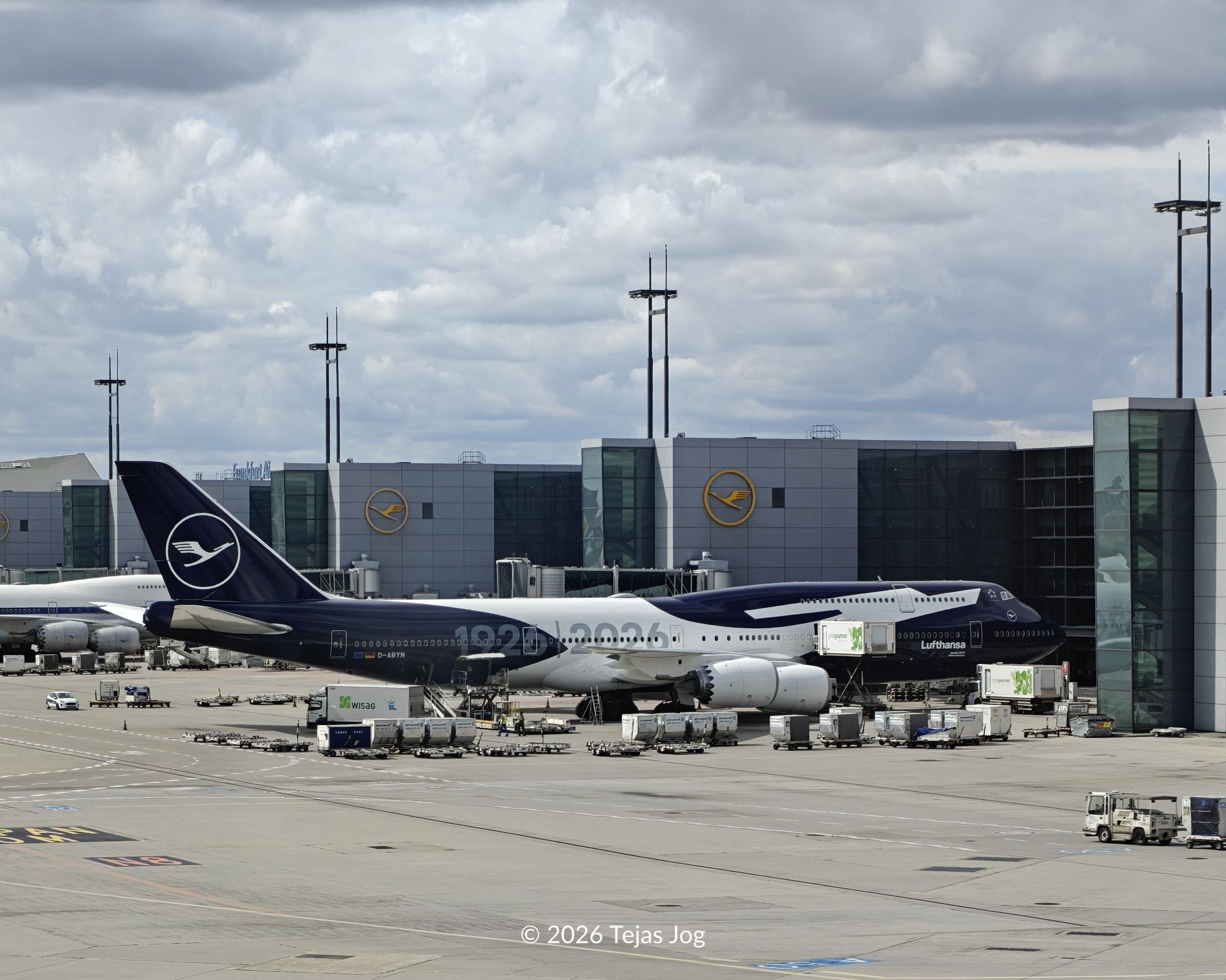 Lufthansa Boeing 747-8 in a special 100th anniversary "Super Crane" blue livery celebrating the airline's 1926–2026 centennial